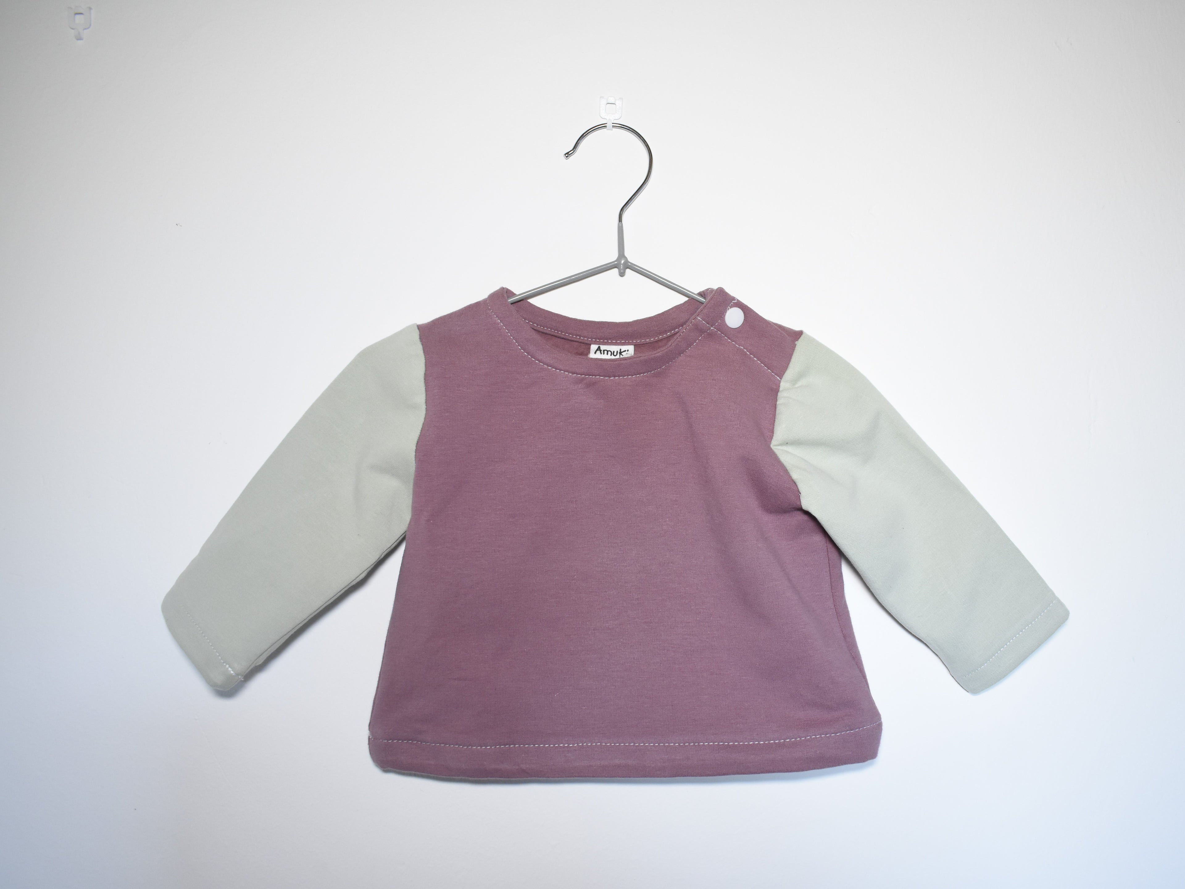 Sudadera Infantil de Algodón Orgánico Rosa con Mangas Verde